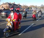 Salford Santa Scooter Run  to The Christie